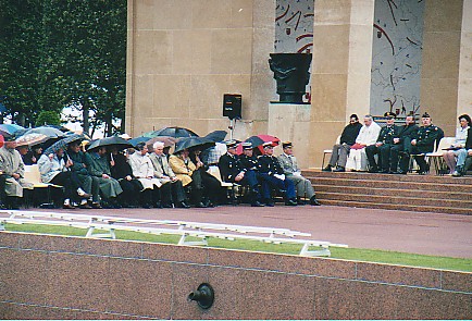 Vets and Guests with Umbrellas.jpg (66126 bytes)